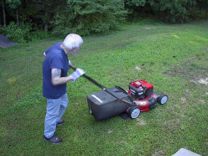 David mowing lawn